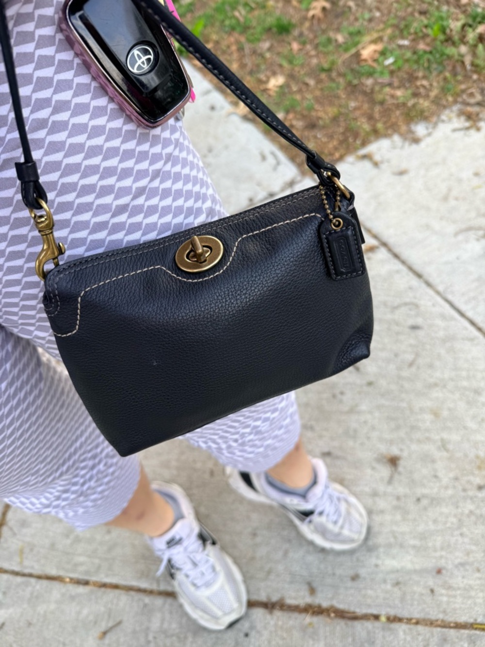 Coach Black Pebbled Leather Turnlock Crossbody Wristlet with Gold-Tone Hardware